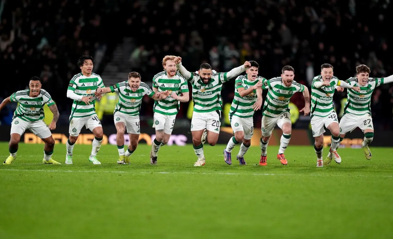 Celtic players celebrate a shoot-out win over Rangers at Hampden in December