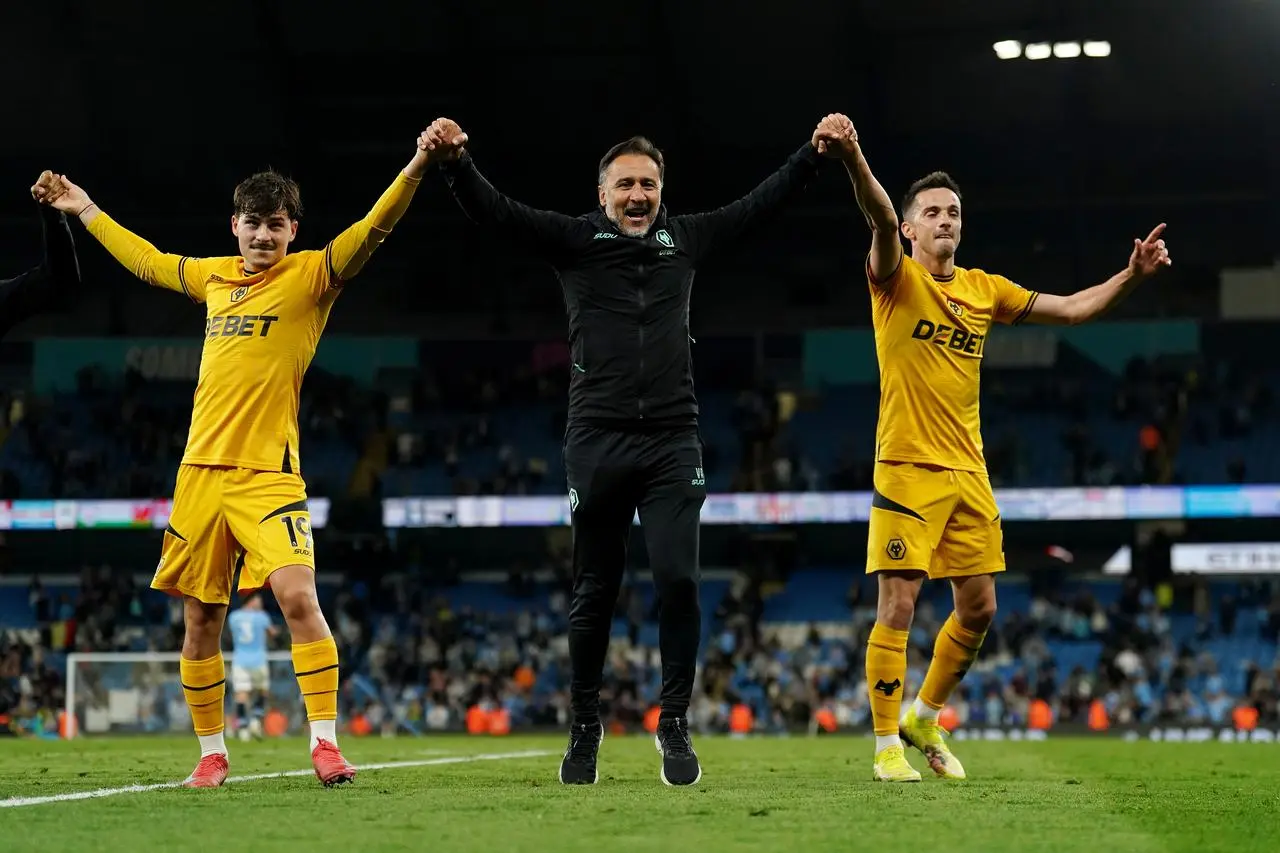 Rodrigo Gomes, Vitor Pereira and Pablo Sarabia salute the Wolves fans