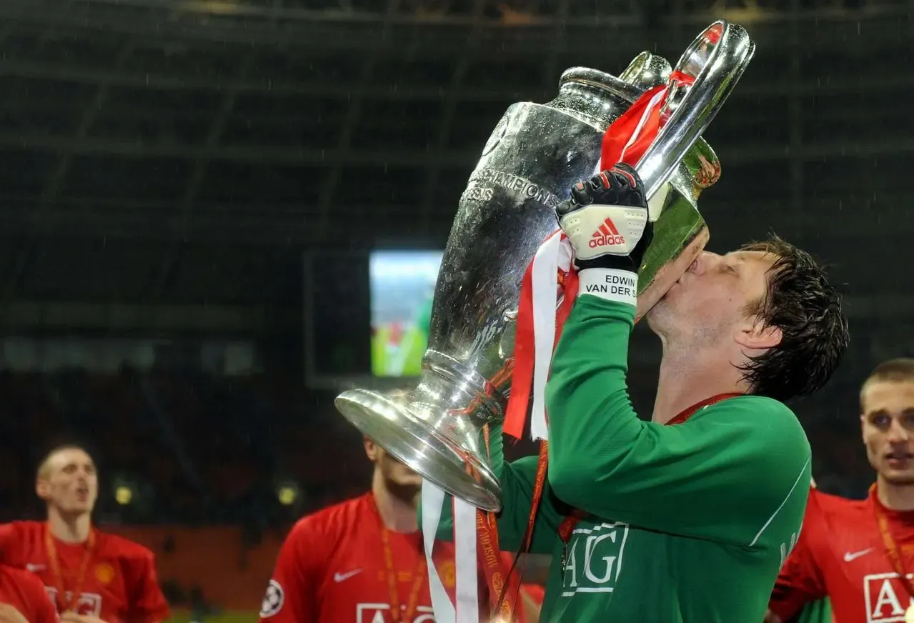Edwin van der Sar kisses the Champions League trophy in 2008