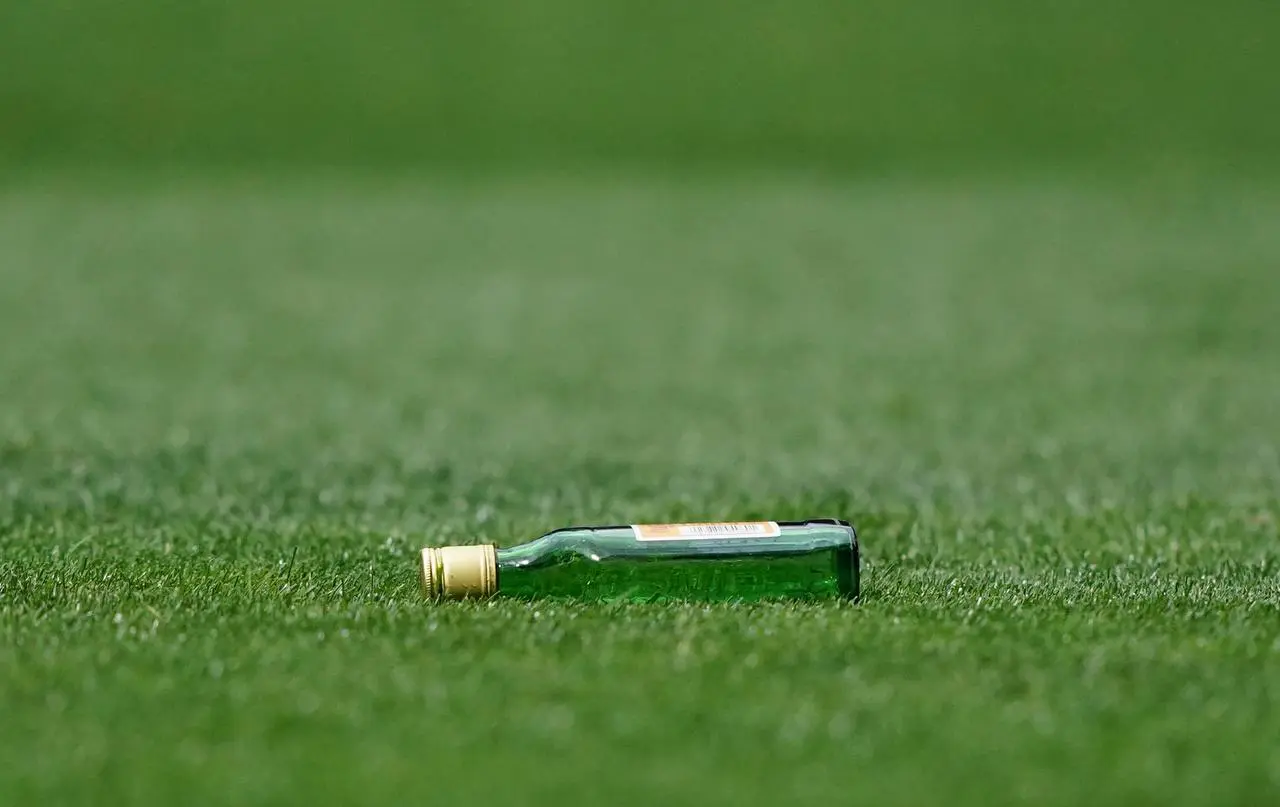 A glass bottle that was thrown onto the pitch 