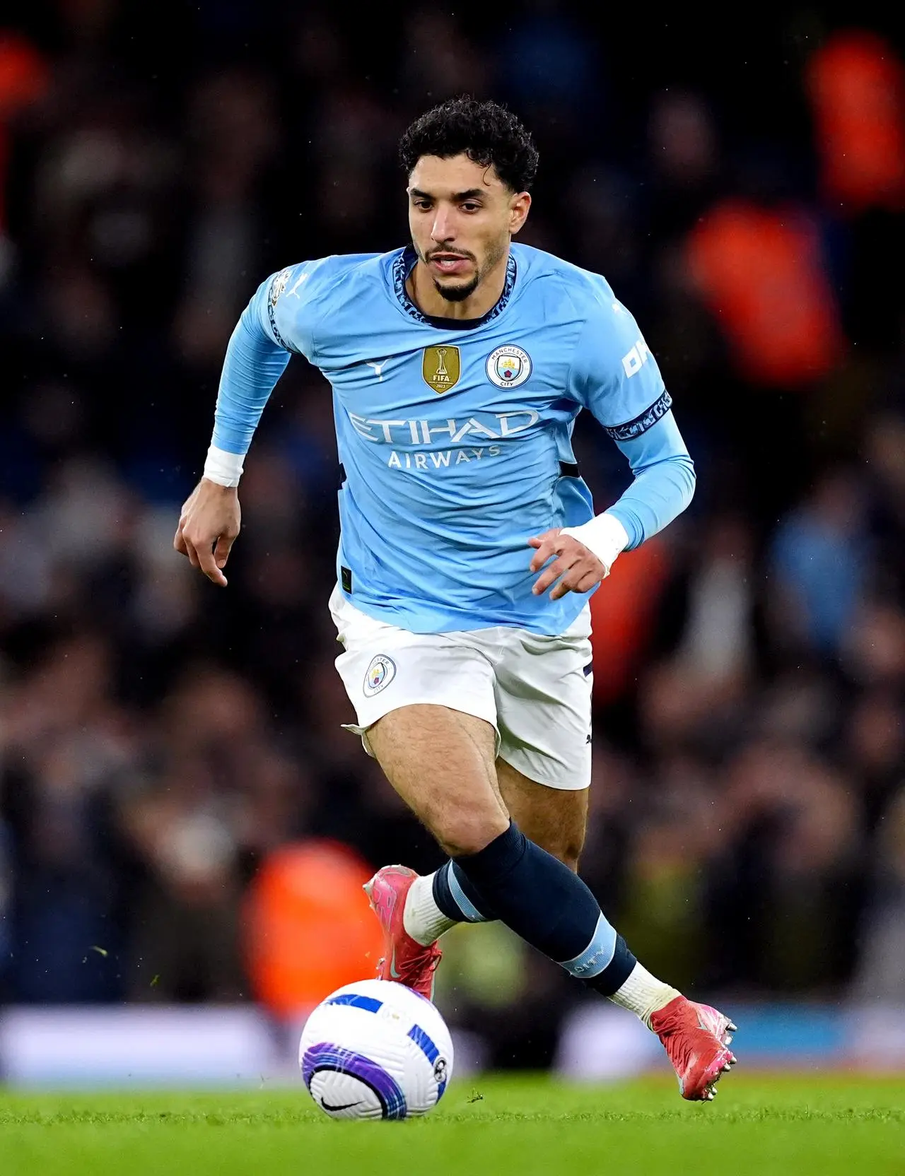 Manchester City forward Omar Marmoush runs with the ball