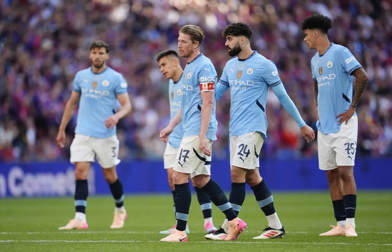 Manchester City players look dejected after defeat in the FA Cup final