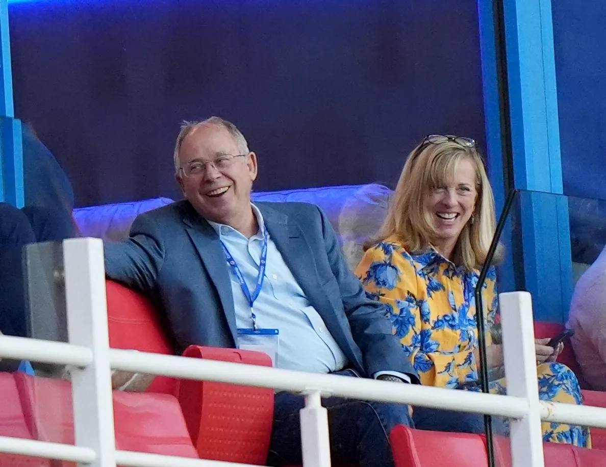 Rob Couhig sits next to a woman