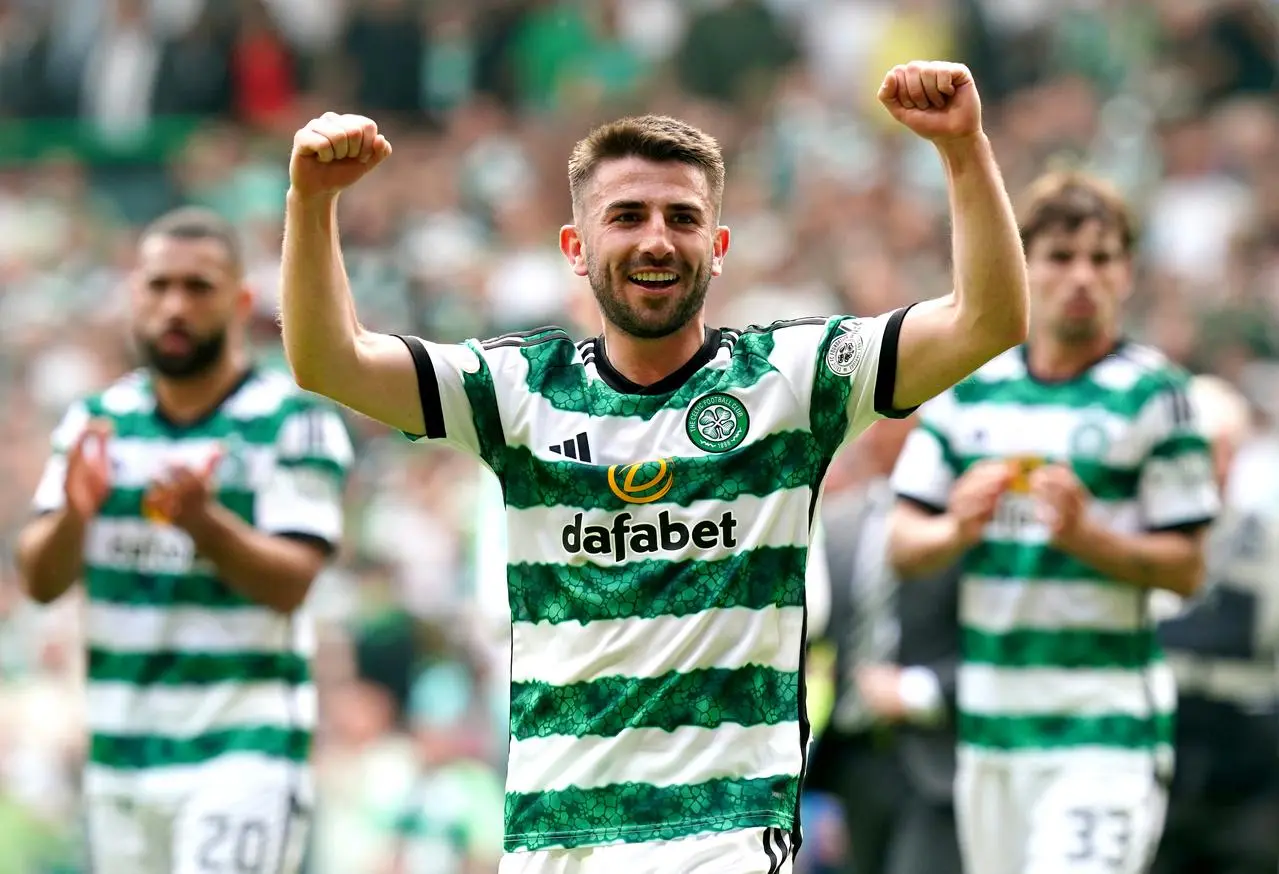 Greg Taylor celebrates