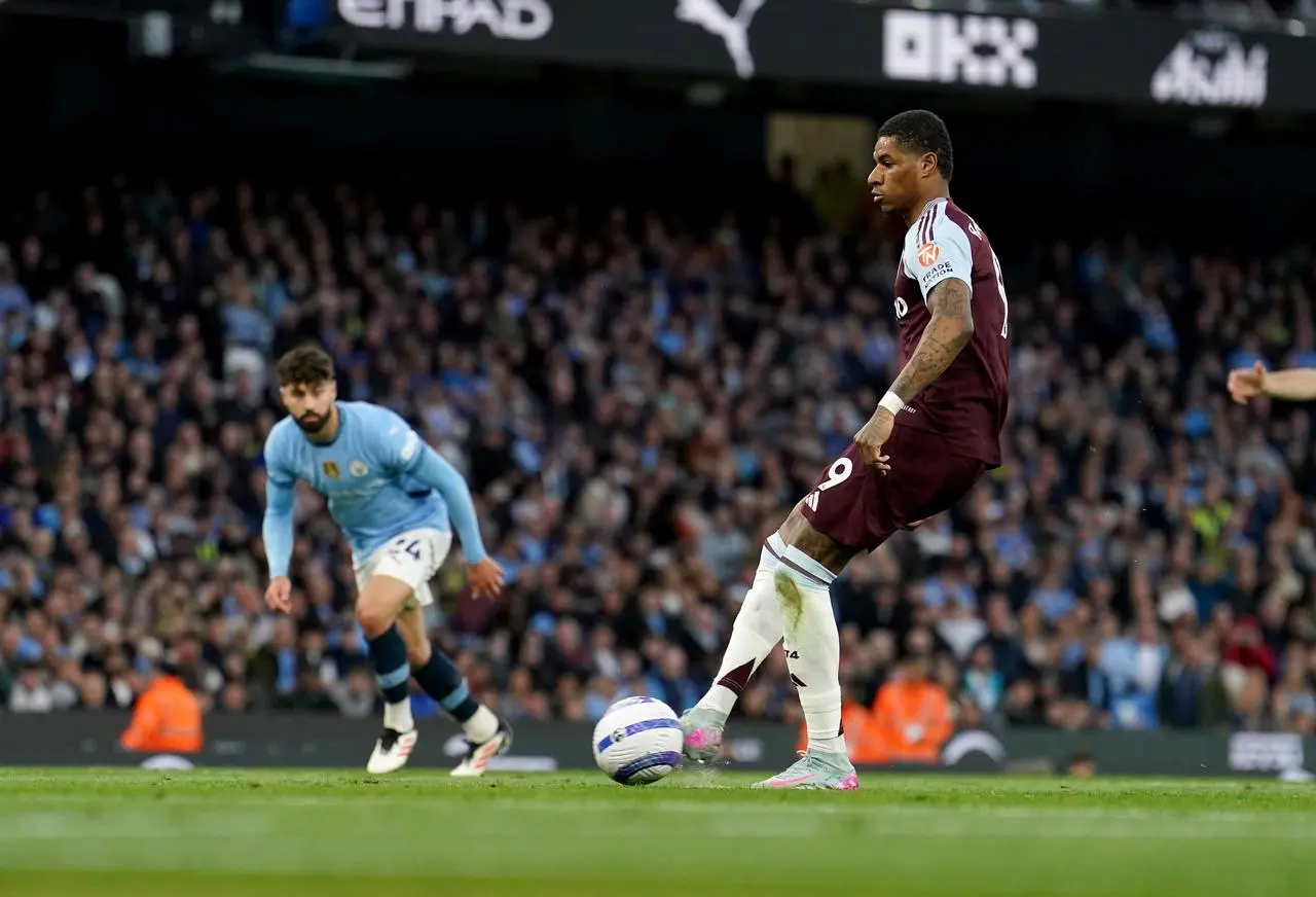 Marcus Rashford scores for Aston Villa in their Premier League match at Manchester City