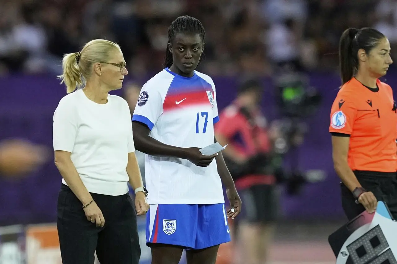 England’s Michelle Agyemang listens to head coach Sarina Wiegman before entering the pitch during the Euro 2025 Group D game against France on Saturday