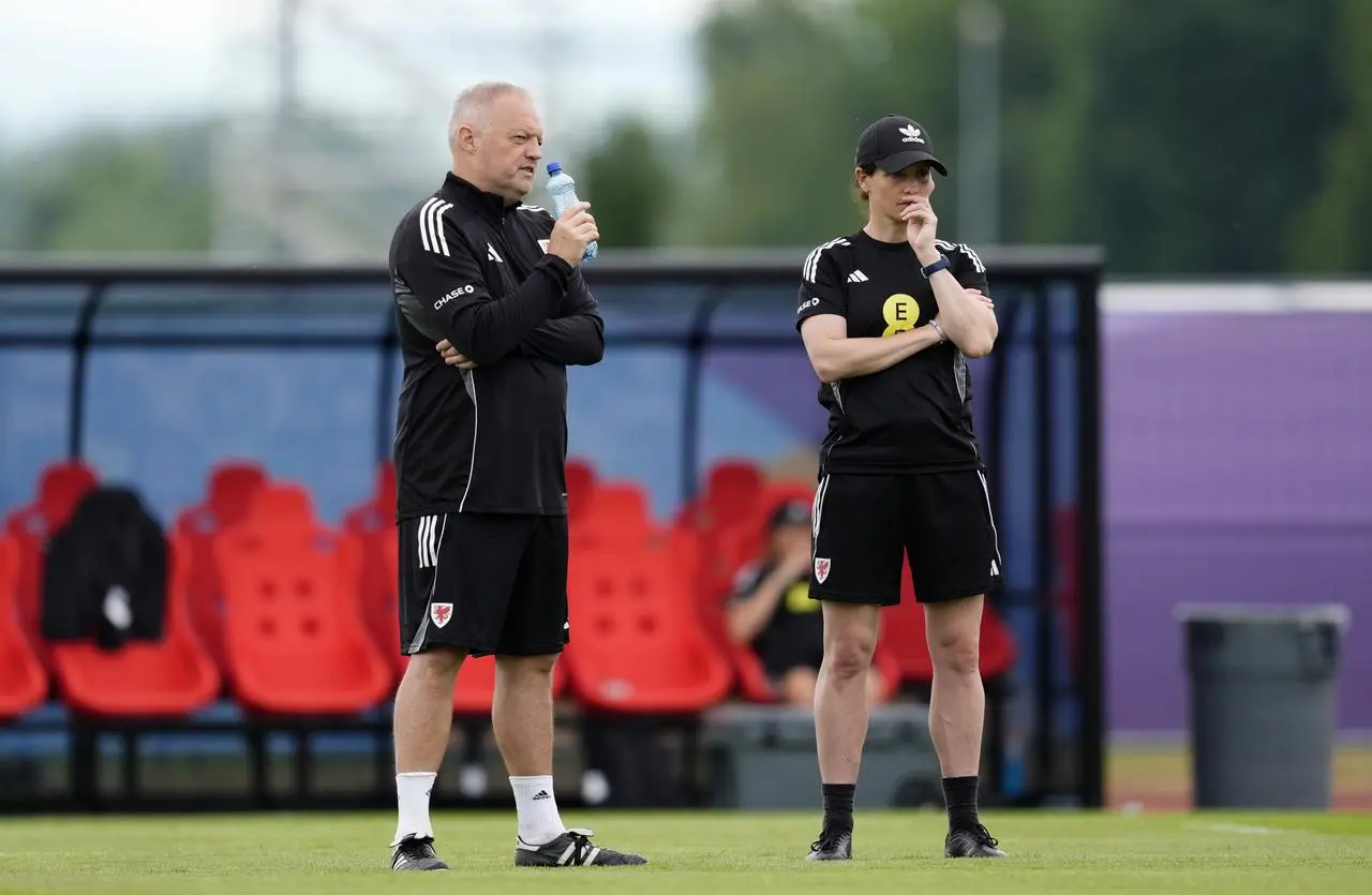 Wales manager Rhian Wilkinson (right) with assistant Jon Grey during a training session at the Sportanlage Guttingersreuti, Lauligstrasse in Switzerland