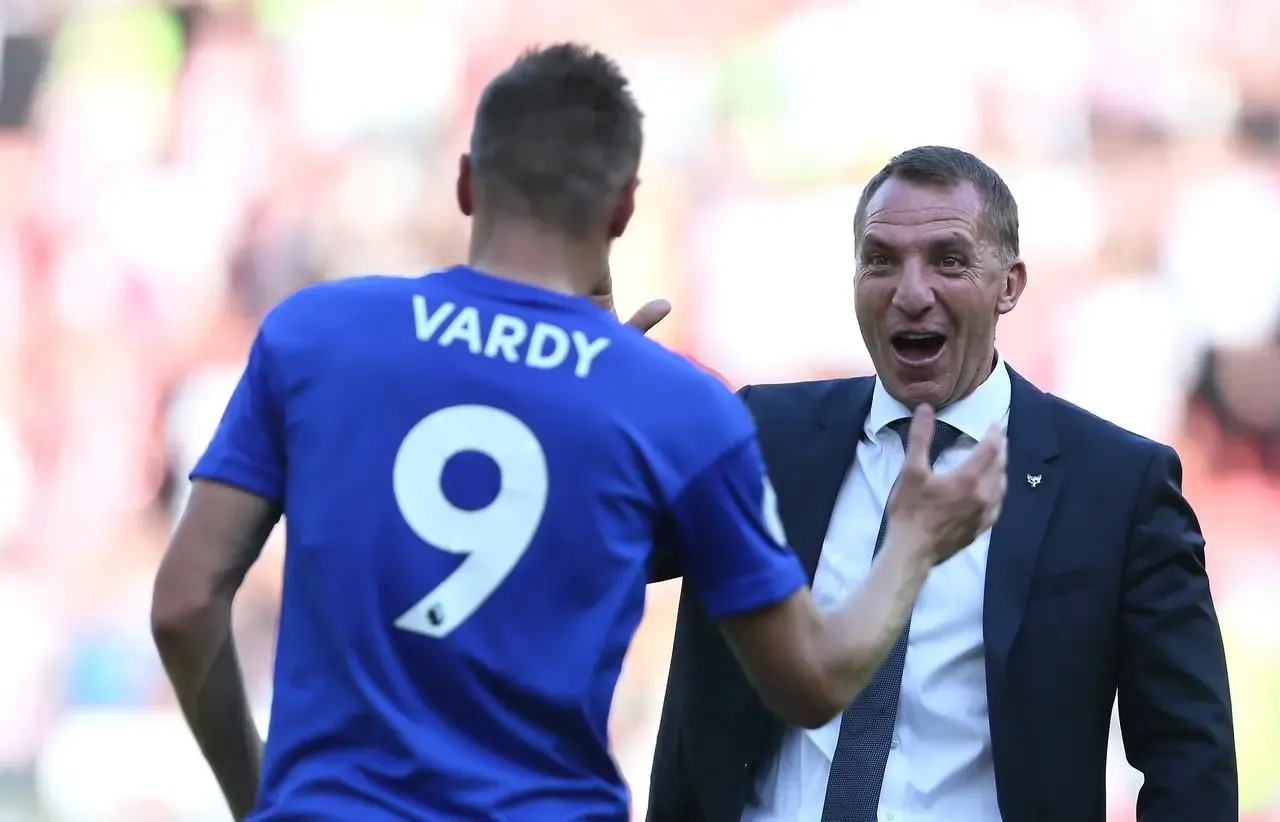 Brendan Rodgers greets Jamie Vardy after a game with Leicester