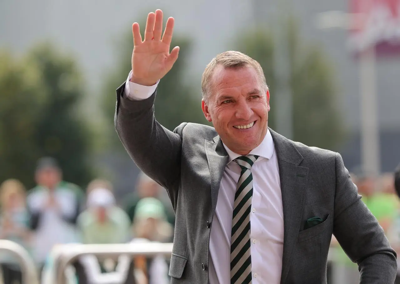 Brendan Rodgers waves