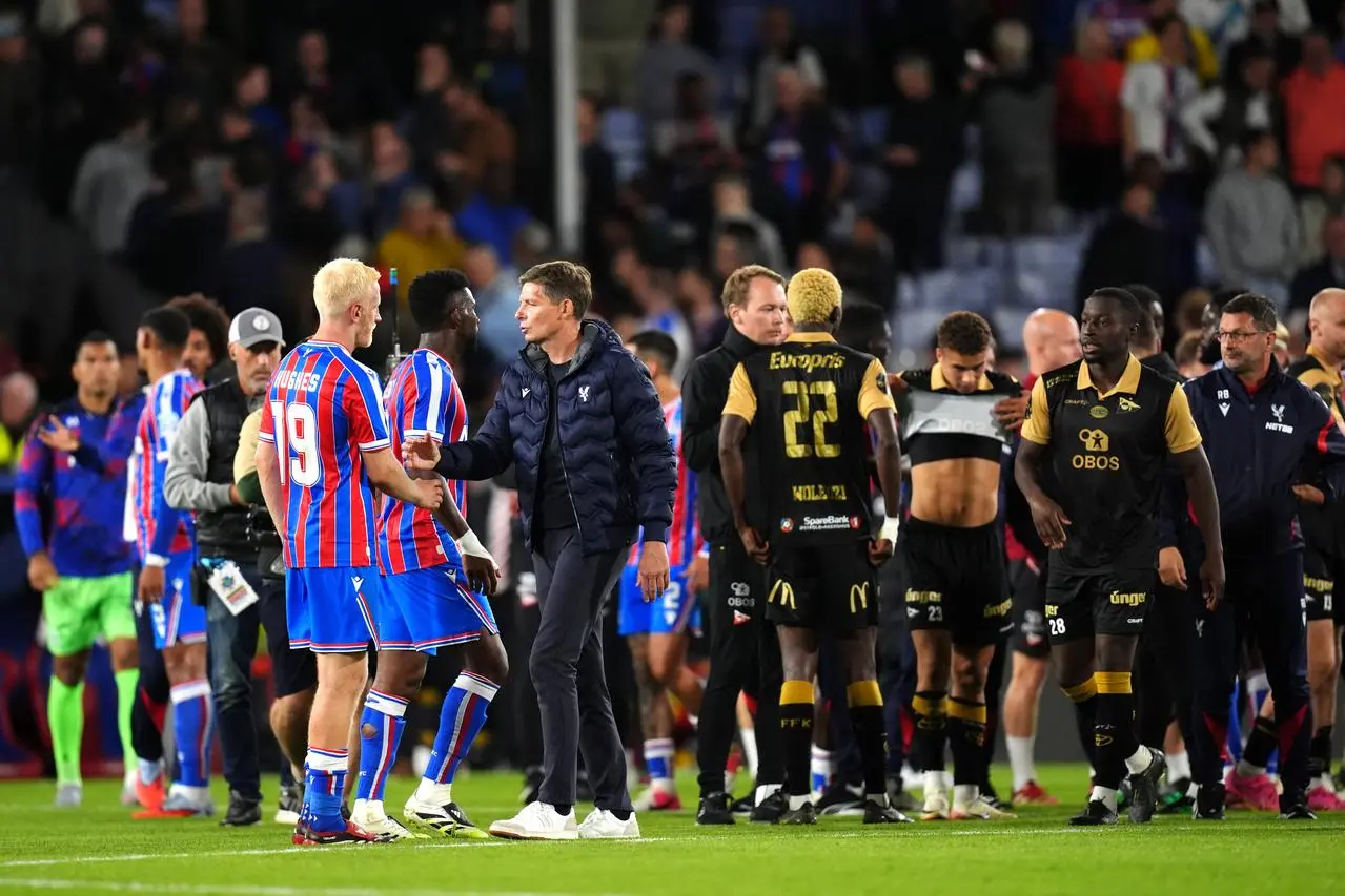 Crystal Palace’s Will Hughes shakes hands with manager Oliver Glasner