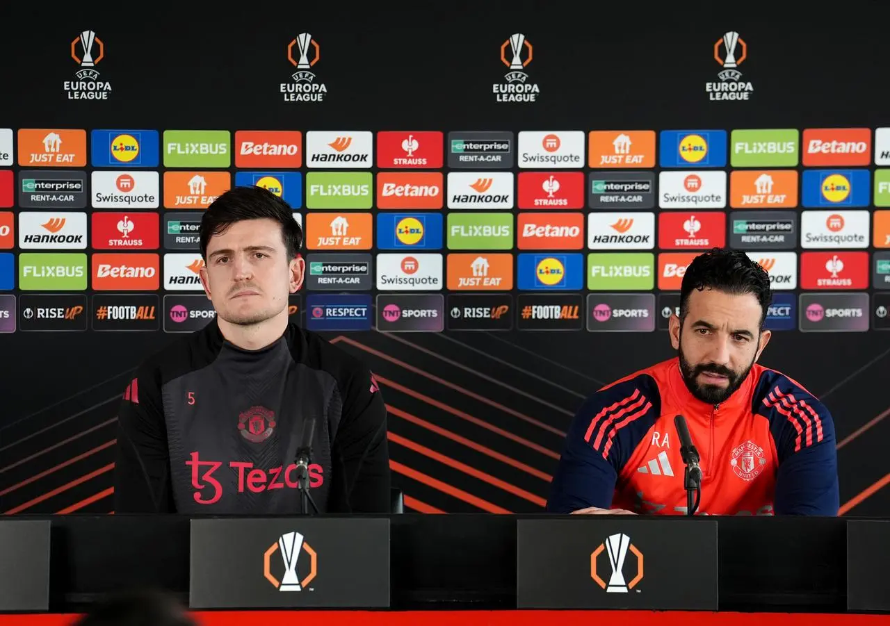 Harry Maguire and Ruben Amorim at a Manchester United press conference