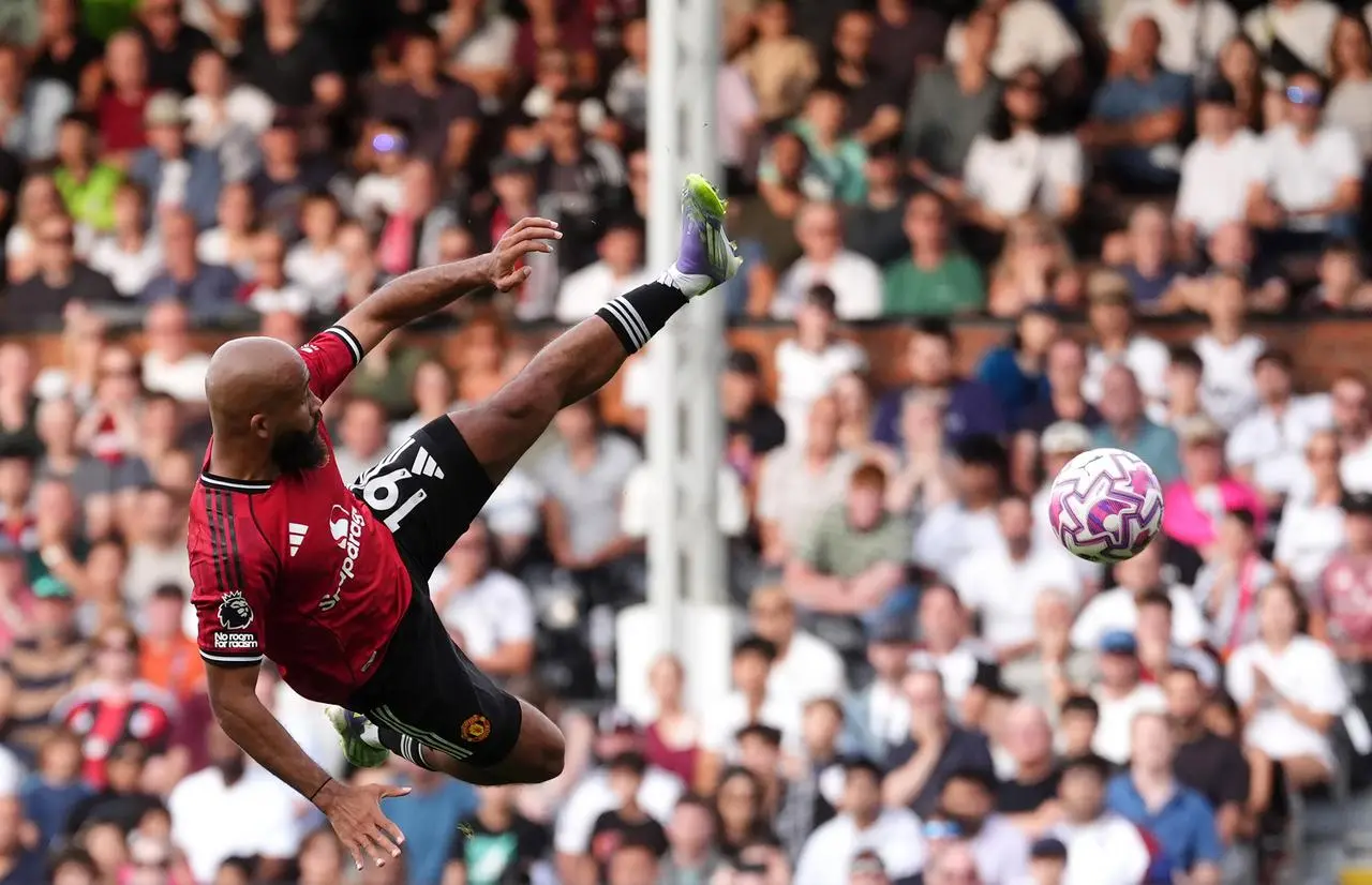 Bryan Mbeumo acrobatically attempts a shot on goal