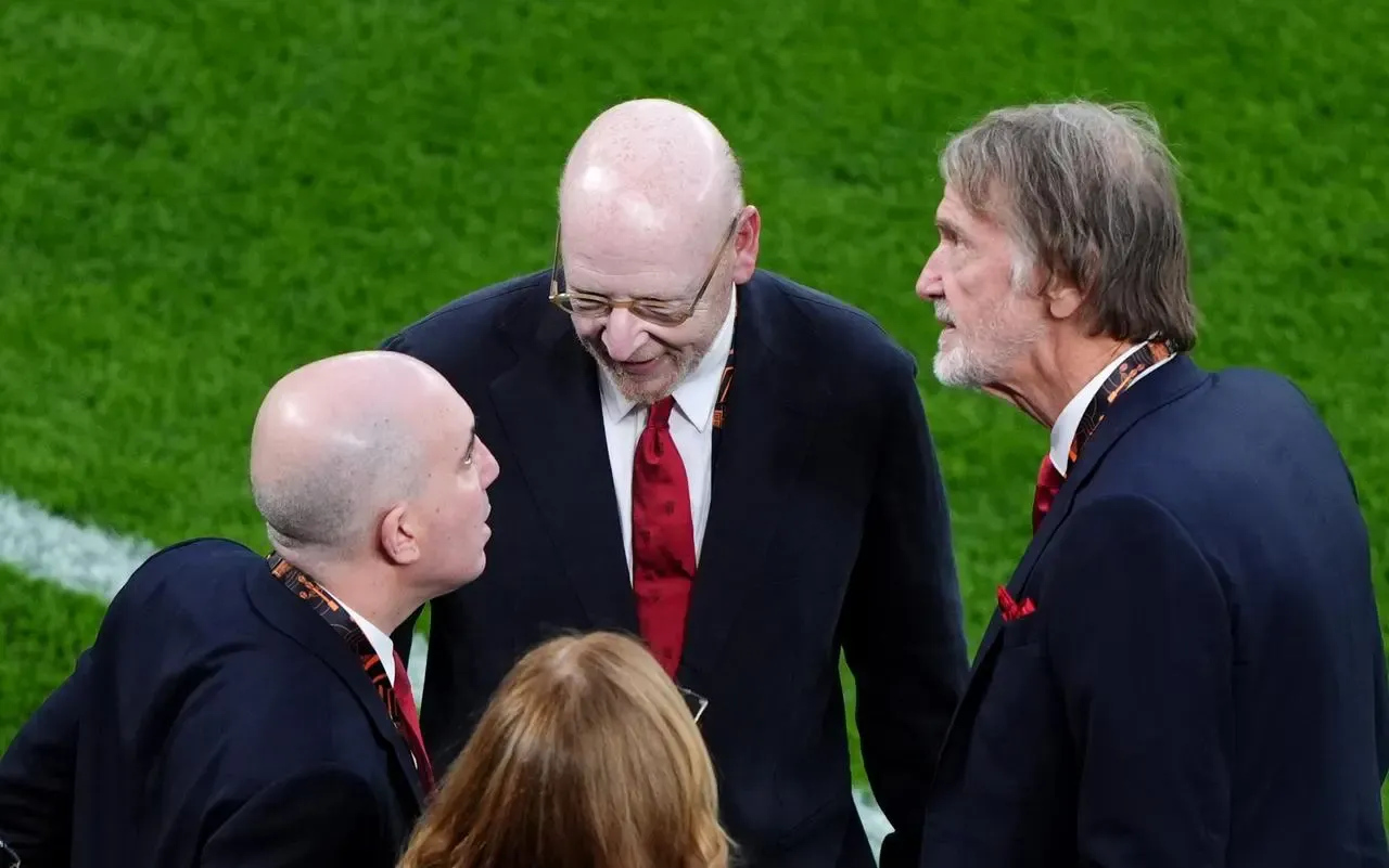 Avram Glazer and Sir Jim Ratcliffe speak to Manchester United chief executive Omar Berrada at the Europa League final