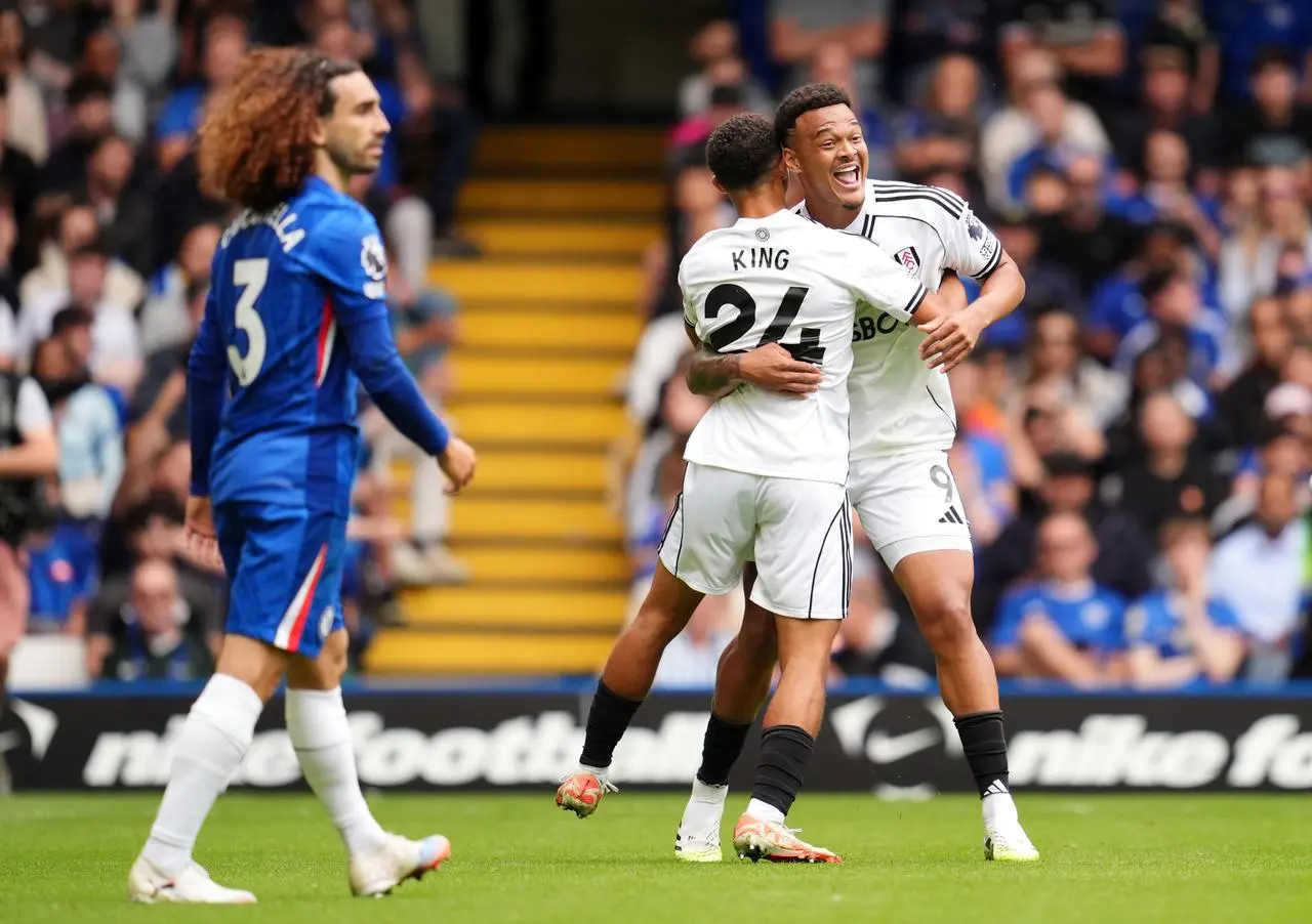 Fulham’s Josh King celebrates with team-mate Rodrigo Muniz (right) after scoring at Chelsea before the goal is ruled out following a VAR review