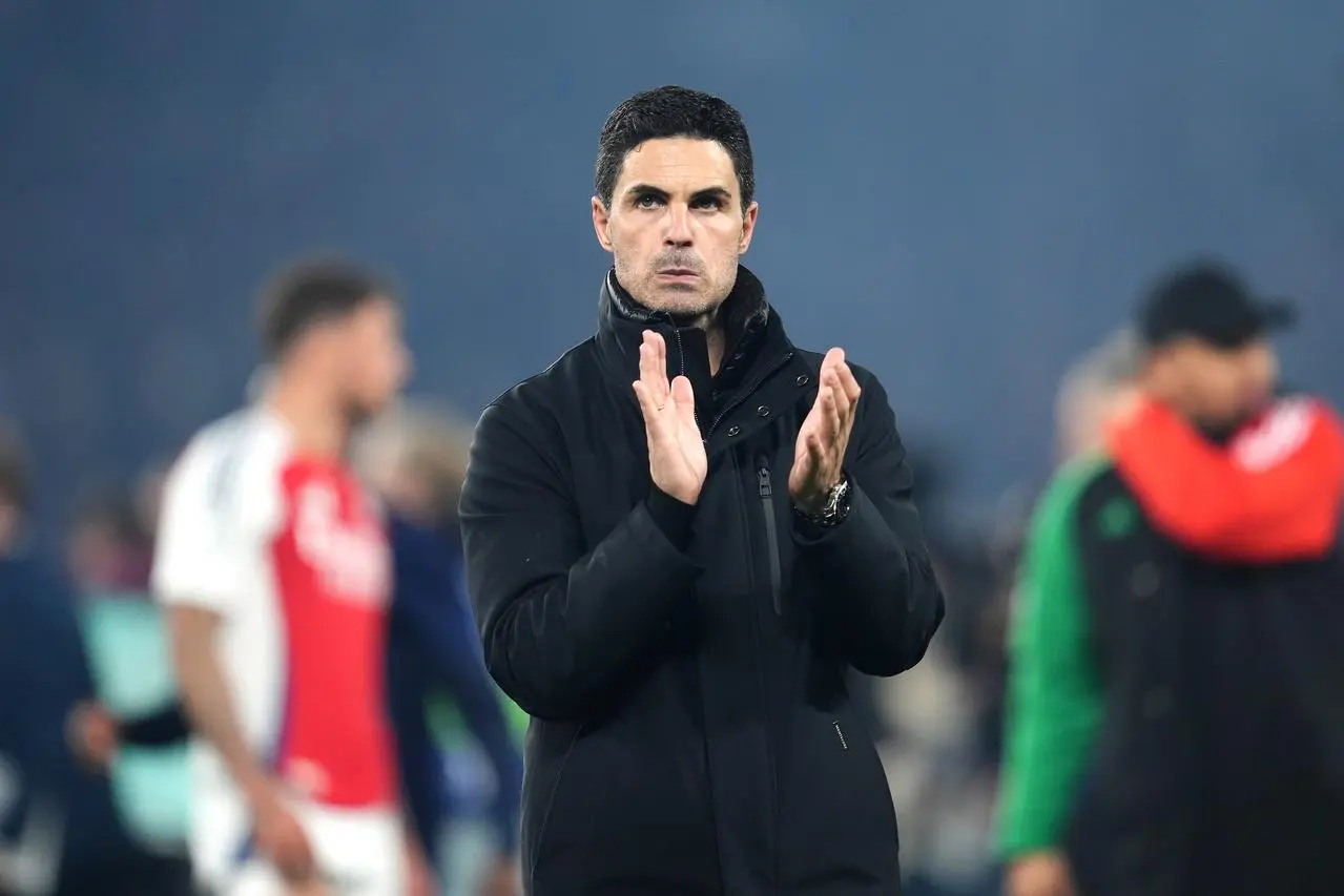 Arsenal manager Mikel Arteta applauds the fans following a Champions League match