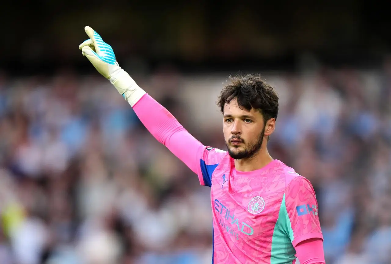 Manchester City goalkeeper James Trafford points during the Premier League match at Molineux 