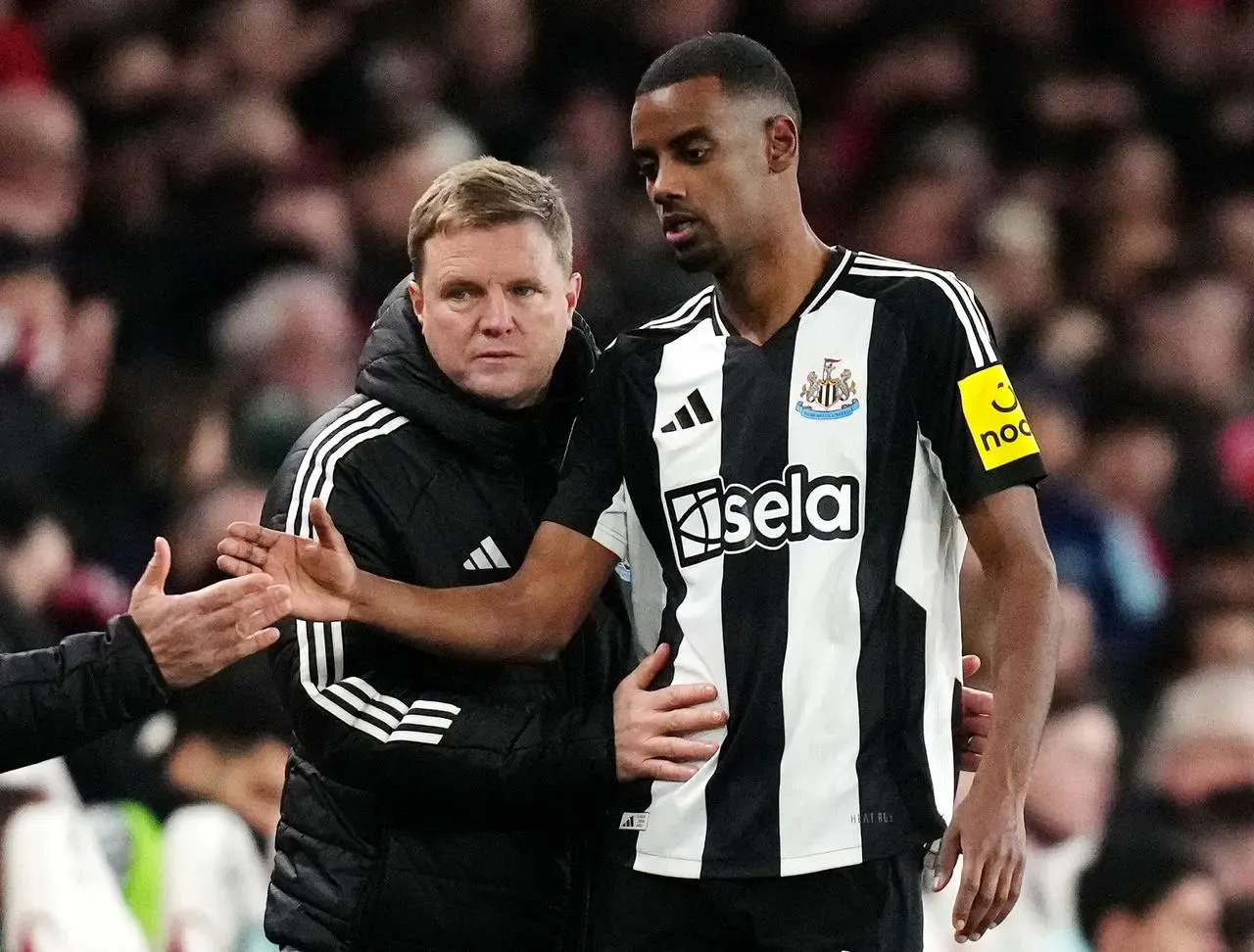 Eddie Howe and Alexander Isak pictured during a match