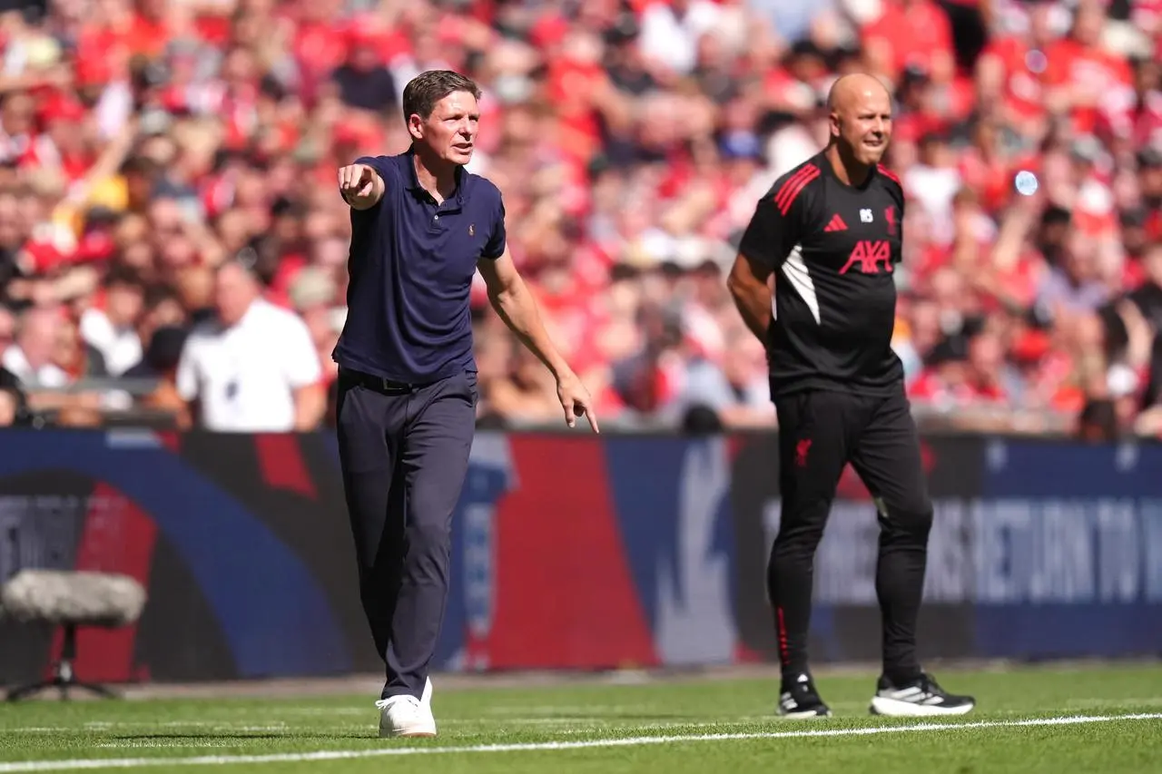 Glasner (left) and Arne Slot on the touchline at Wembley