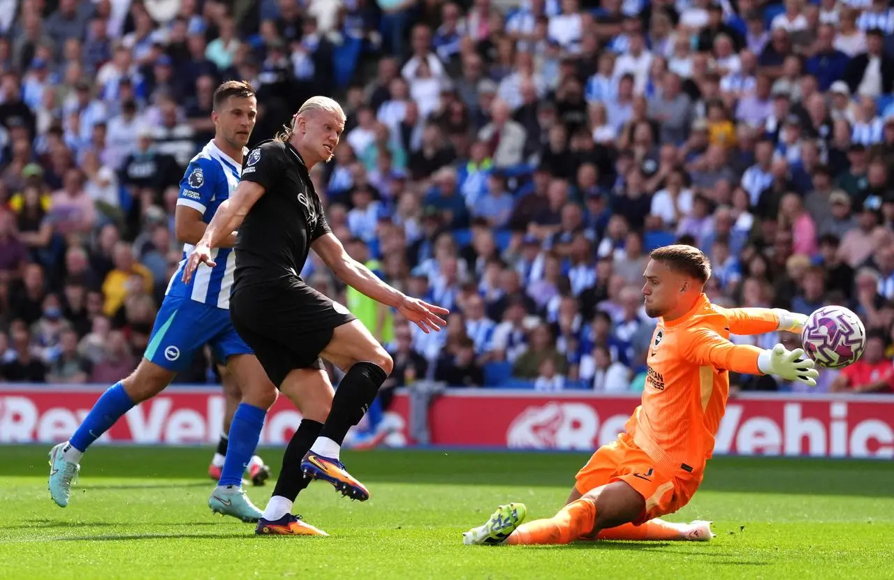 Erling Haaland, second left, opens the scoring for Manchester City at Brighton