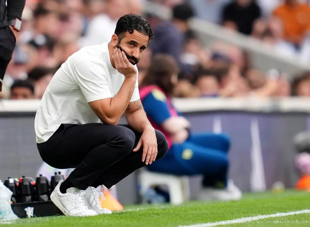 Ruben Amorim crouched down