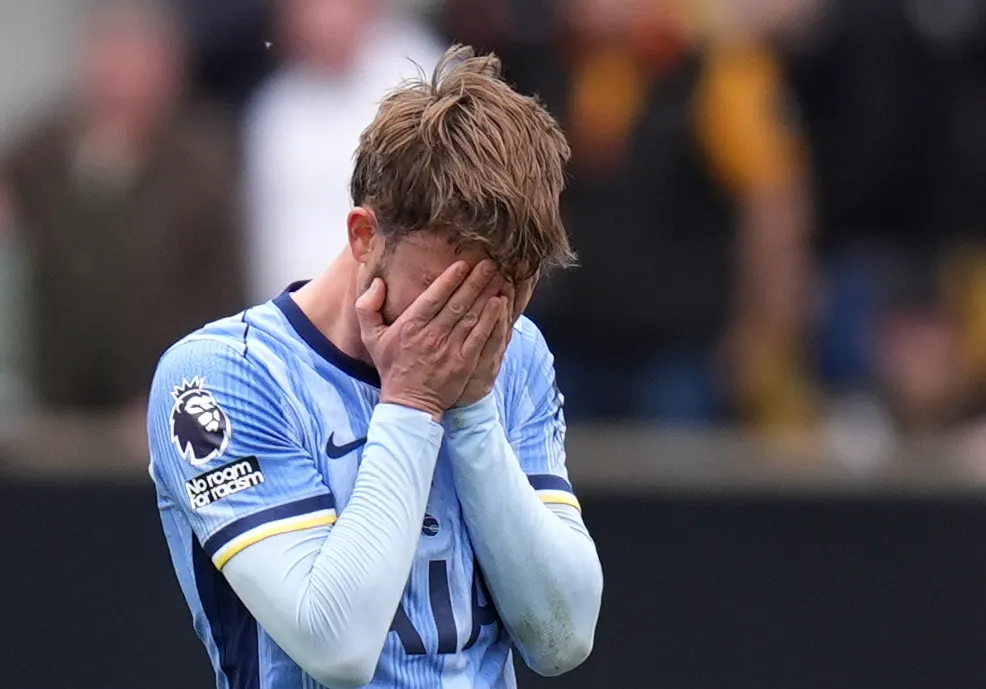 James Maddison with his head in his hands after team-mate Djed Spence scores an own goal against Wolves