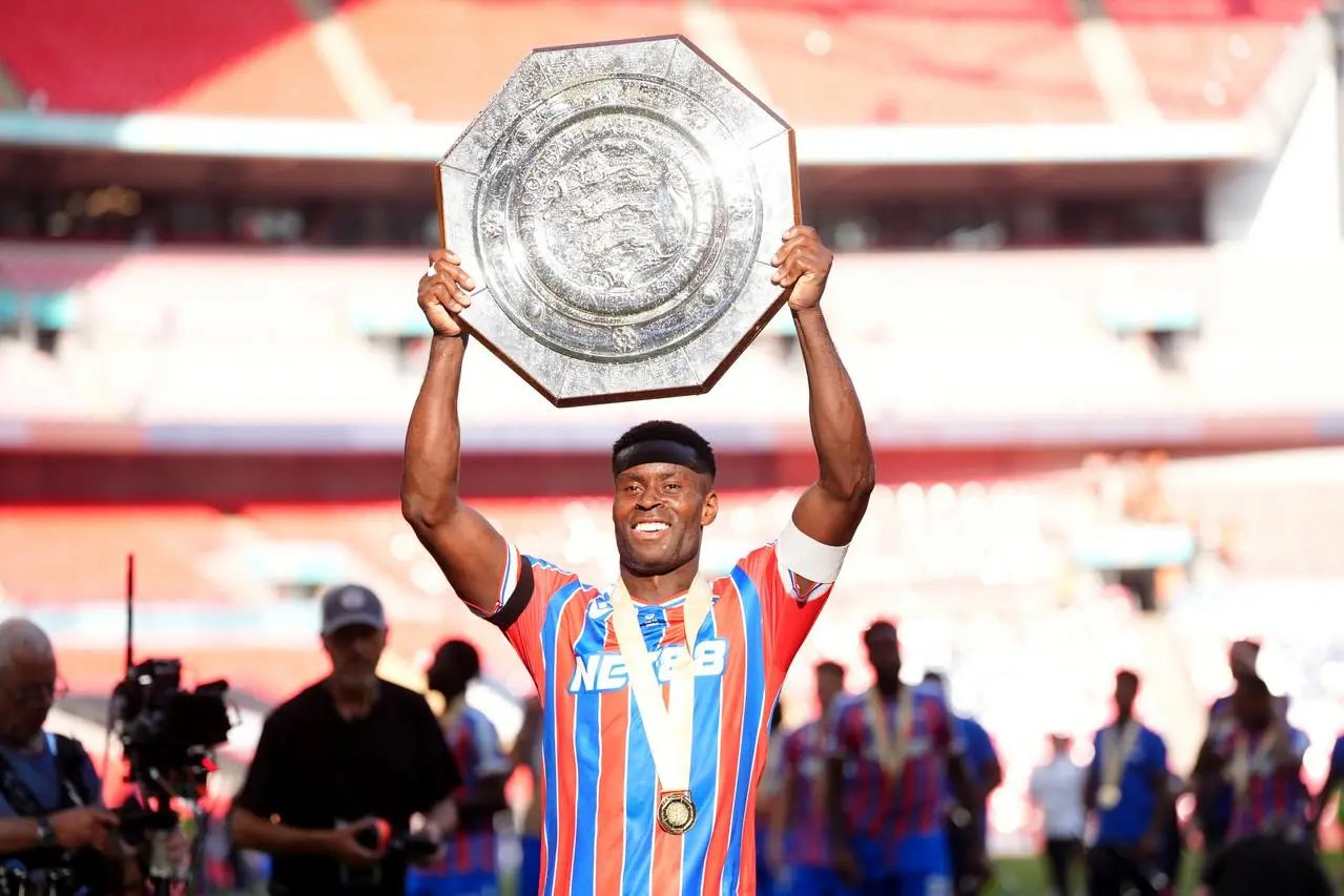 Marc Guehi lifts the Community Shield trophy