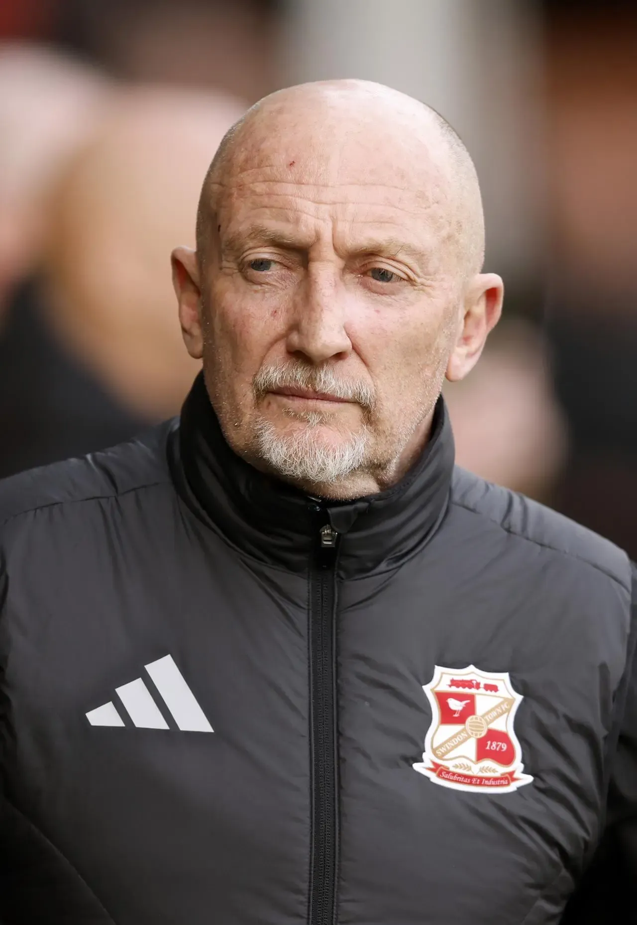 Swindon manager Ian Holloway wearing a club jacket