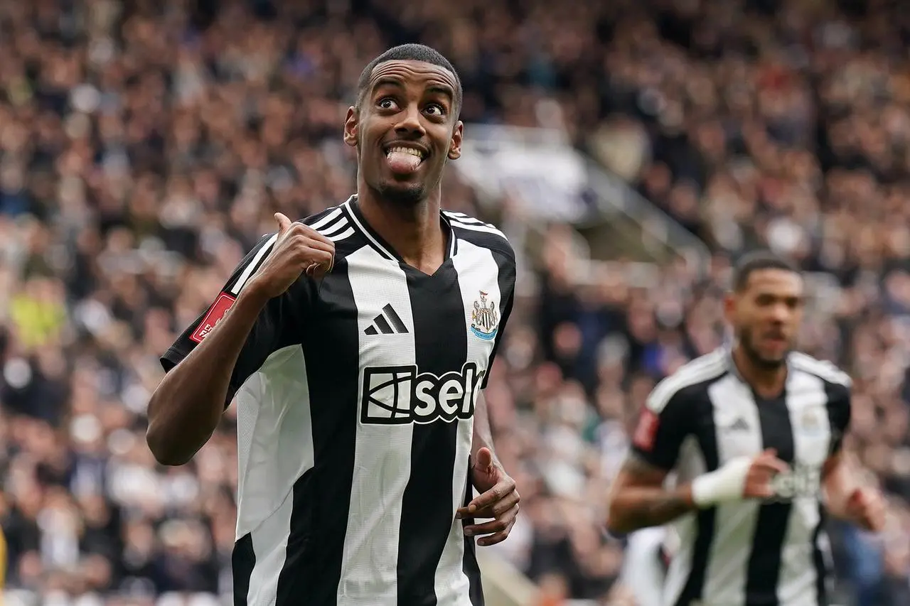 Alexander Isak celebrates scoring a goal for Newcastle