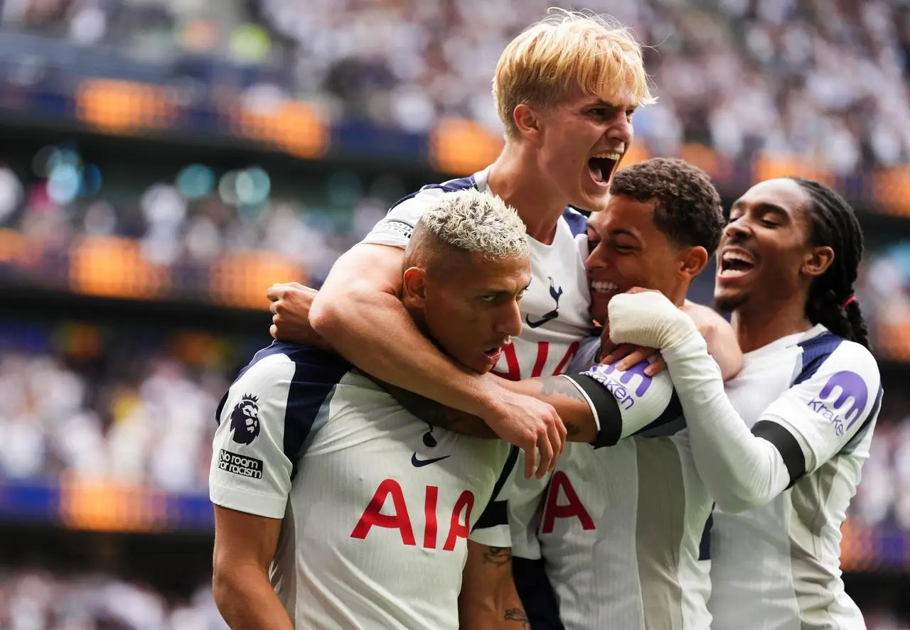 Tottenham’s Richarlison (left) celebrates scoring the opening goal