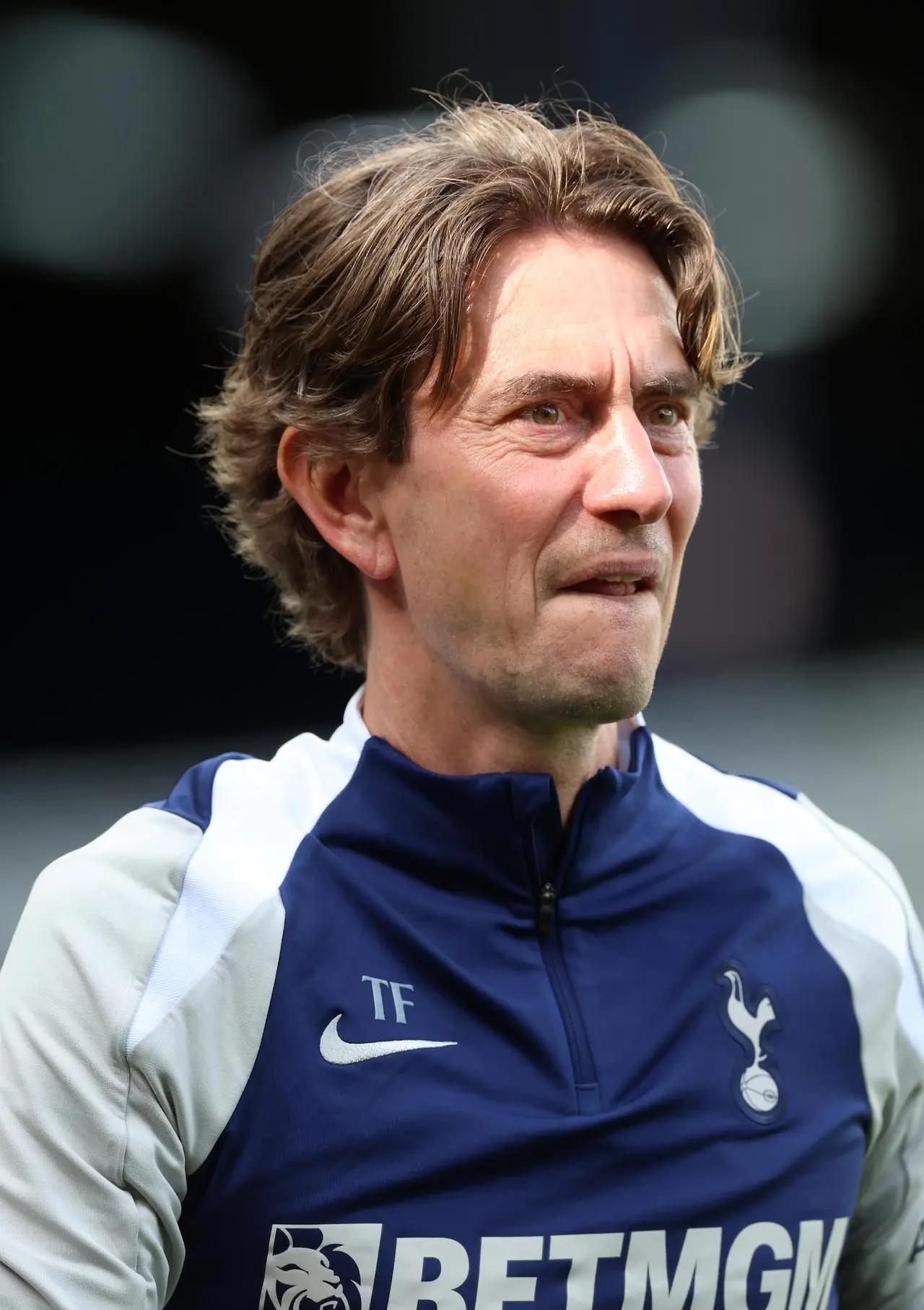 Tottenham Hotspur manager Thomas Frank applauds fans