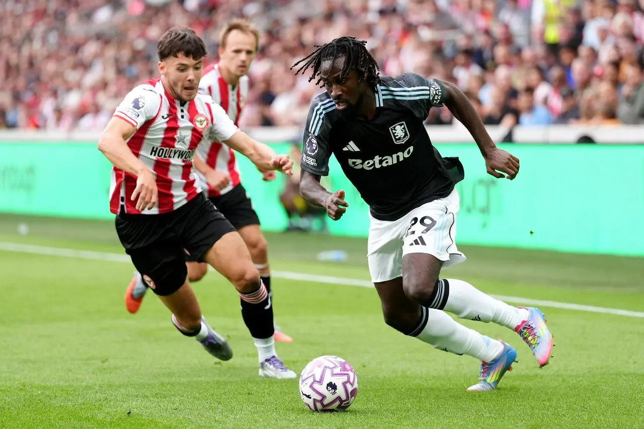 Aaron Hickey (left) against Aston Villa
