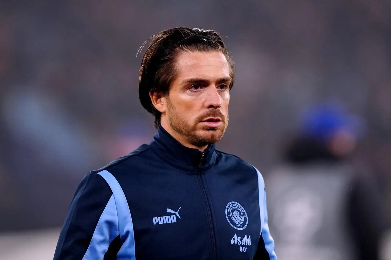 Manchester City’s Jack Grealish warms up ahead of a Champions League game against Real Madrid
