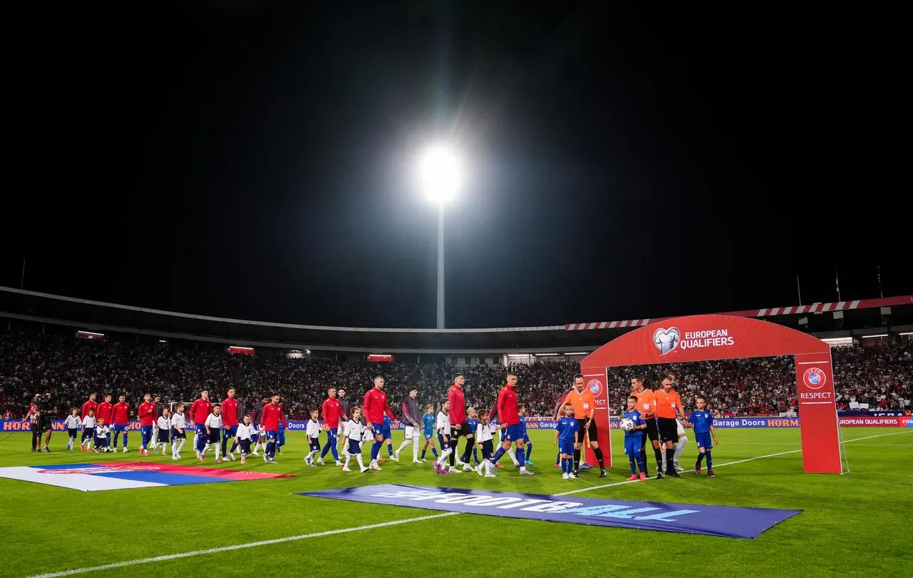 Serbia and England players walk out at the Rajko Mitic Stadium
