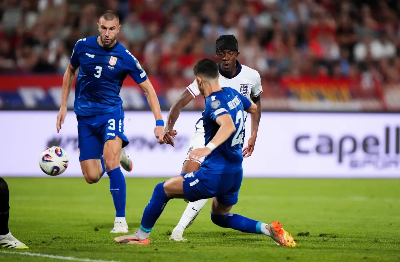 Noni Madueke, right, scores England's second goal against Serbia