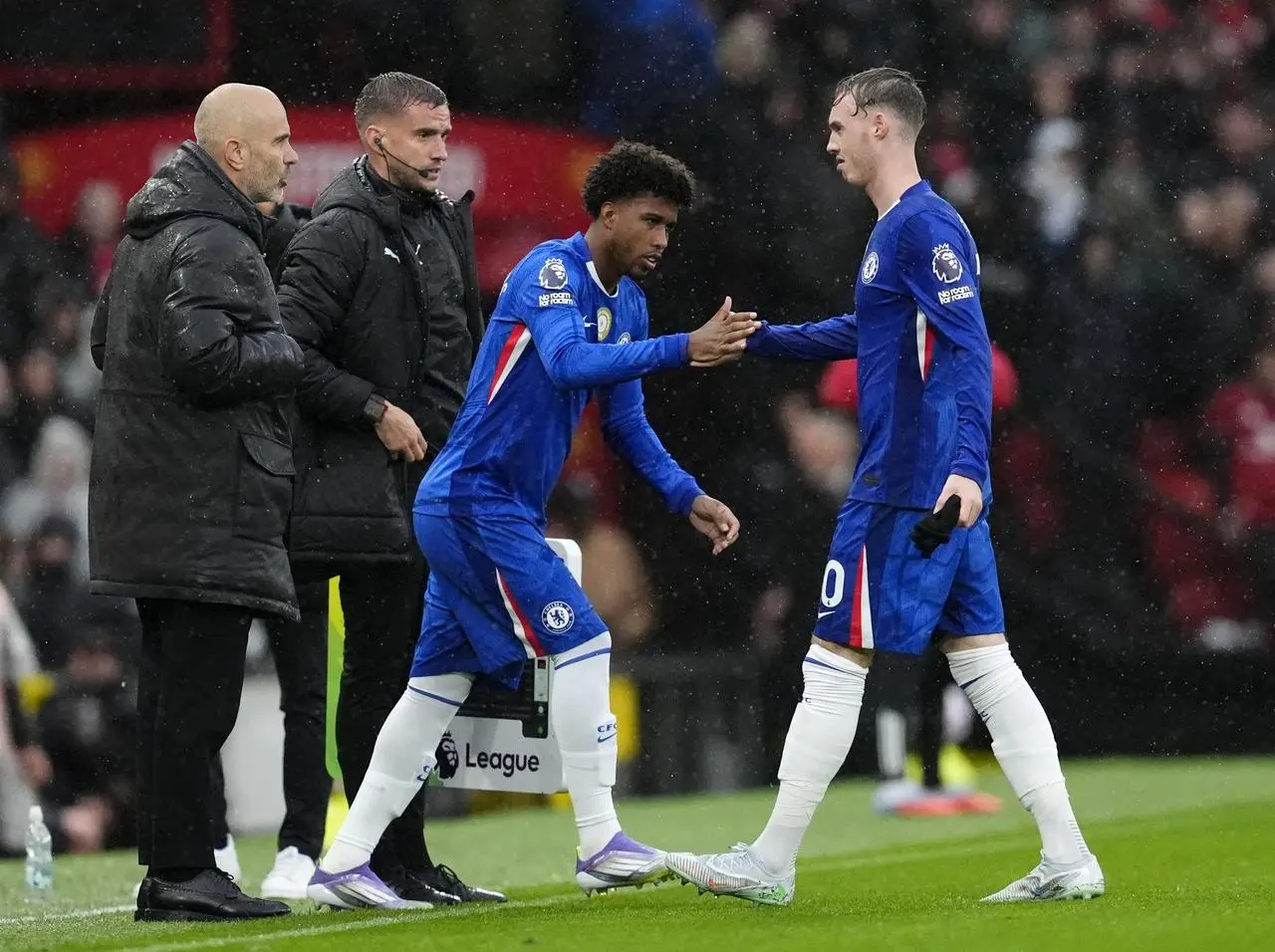 Cole Palmer, right, walks off the pitch