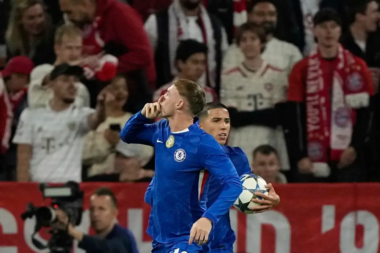 Cole Palmer, centre, celebrates after scoring Chelsea's goal