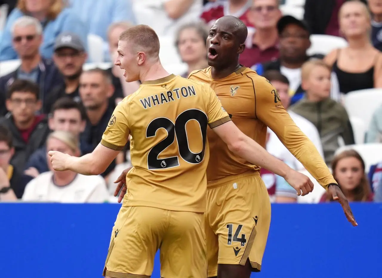 Jean-Philippe Mateta, right, celebrates