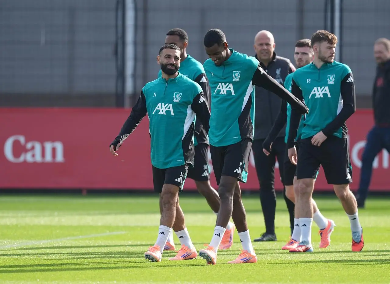 Liverpool’s Mohamed Salah (left) and Alexander Isak (right) during a training session at the AXA Training Centre on Monday