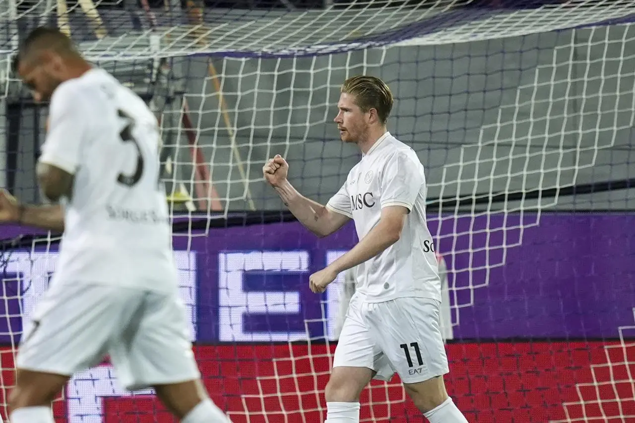 Napoli’s Kevin De Bruyne celebrates after scoring a penalty against Fiorentina