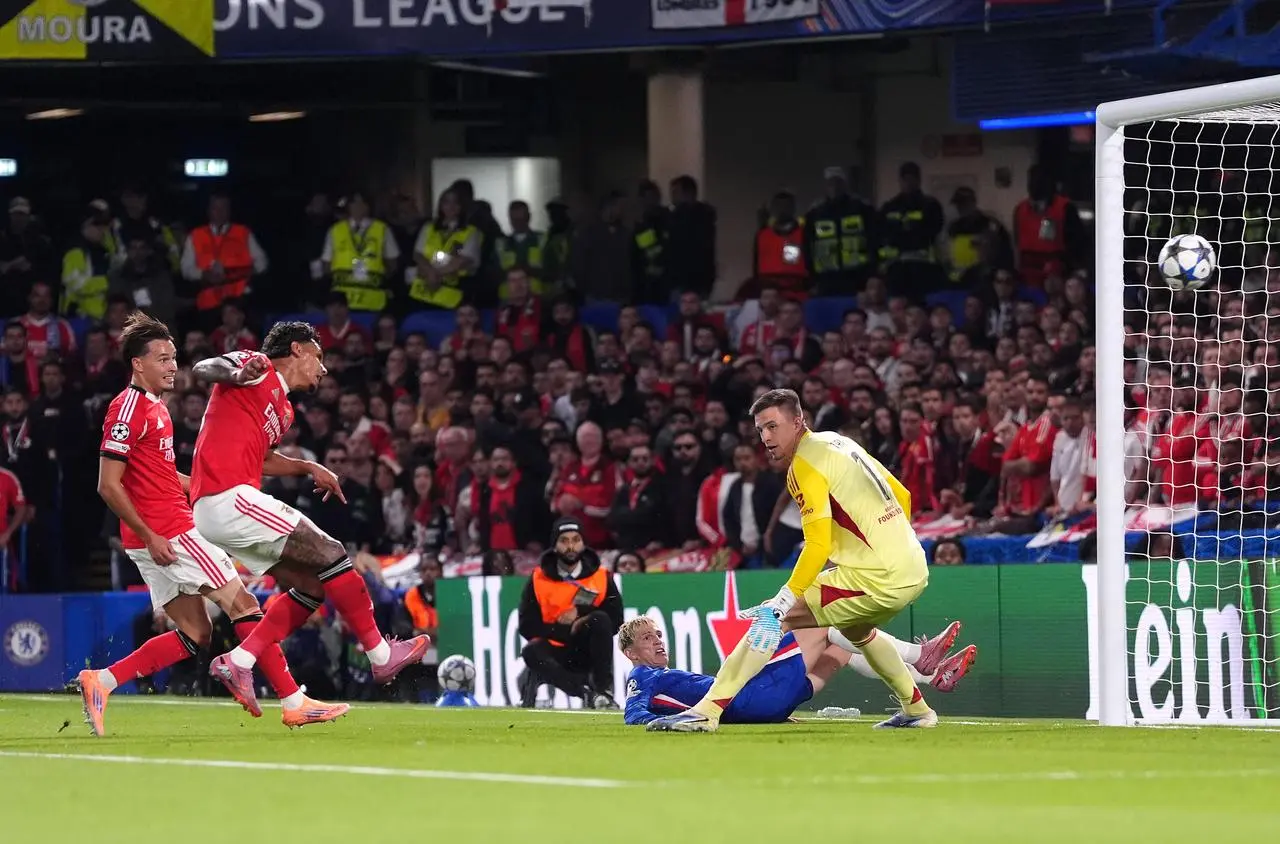 Benfica’s Richard Rios scores an own goal to hand Chelsea victory