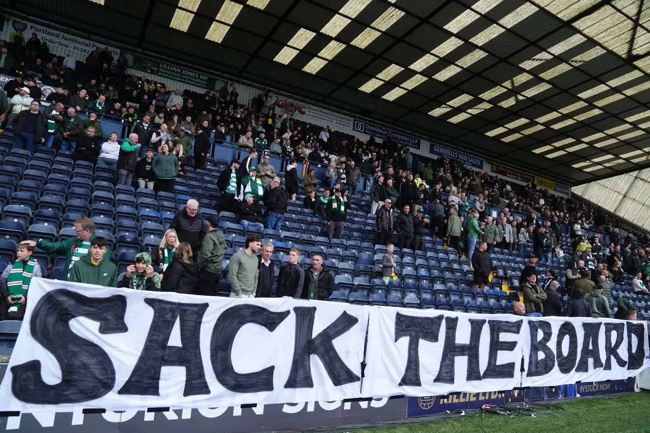 Celtic fans display a banner reading 'Sack the Board'