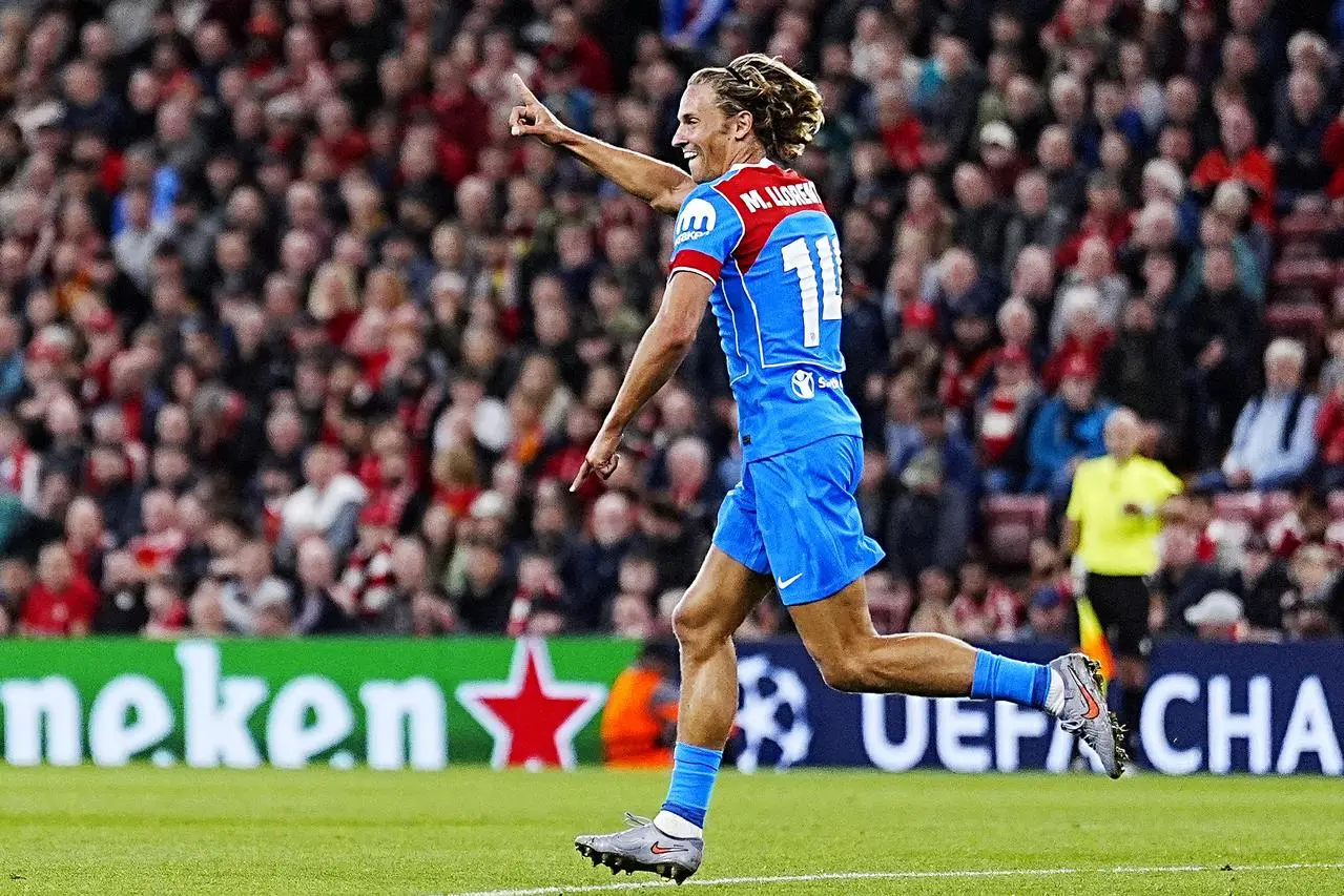 Marcos Llorente celebrates after scoring for Atletico Madrid