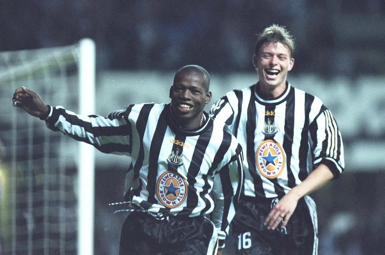 Jon Dahl Tomasson rushes to congratulate Faustino Asprilla after he completed a Champions League hat-trick against Barcelona
