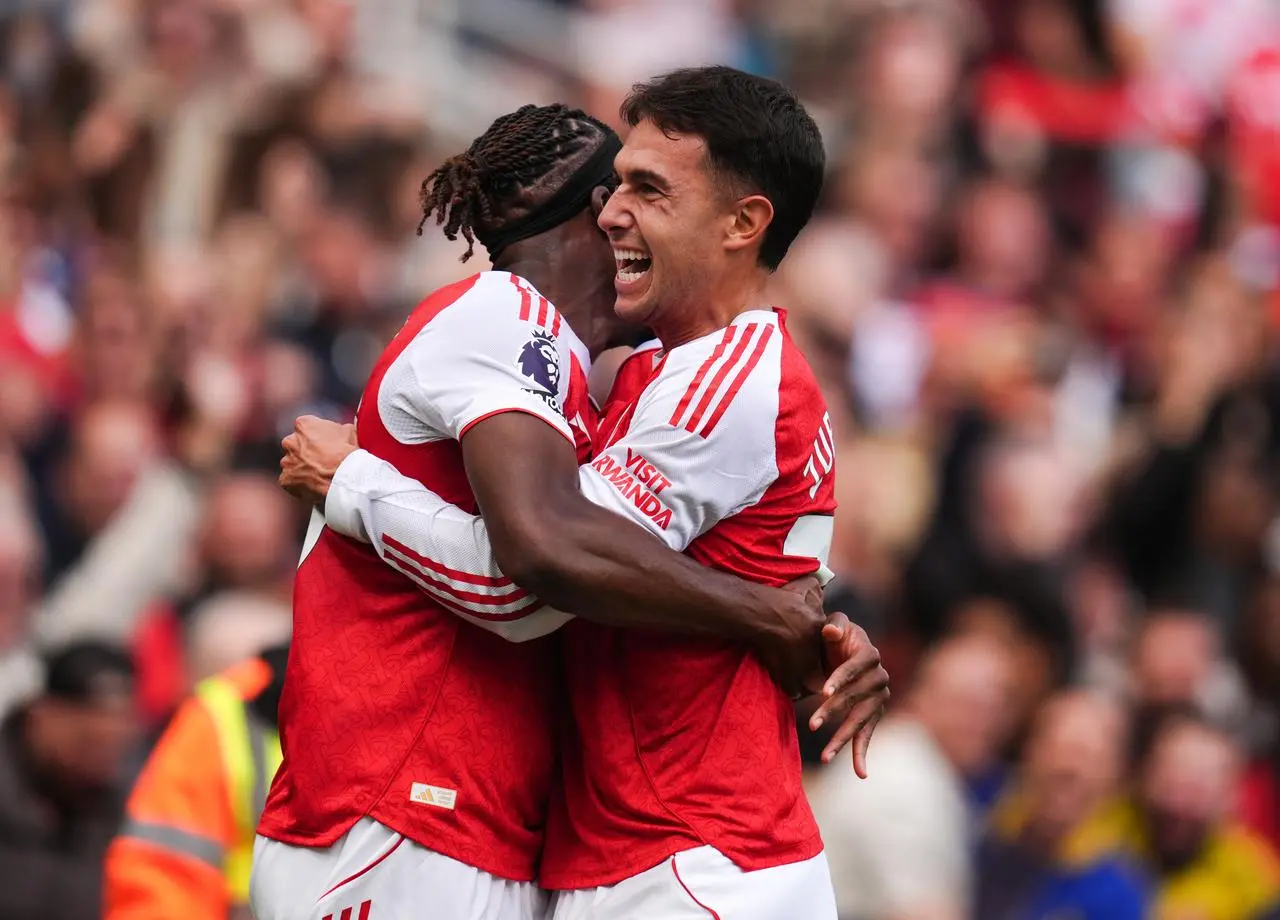 Martin Zubimendi celebrates with Noni Madueke 