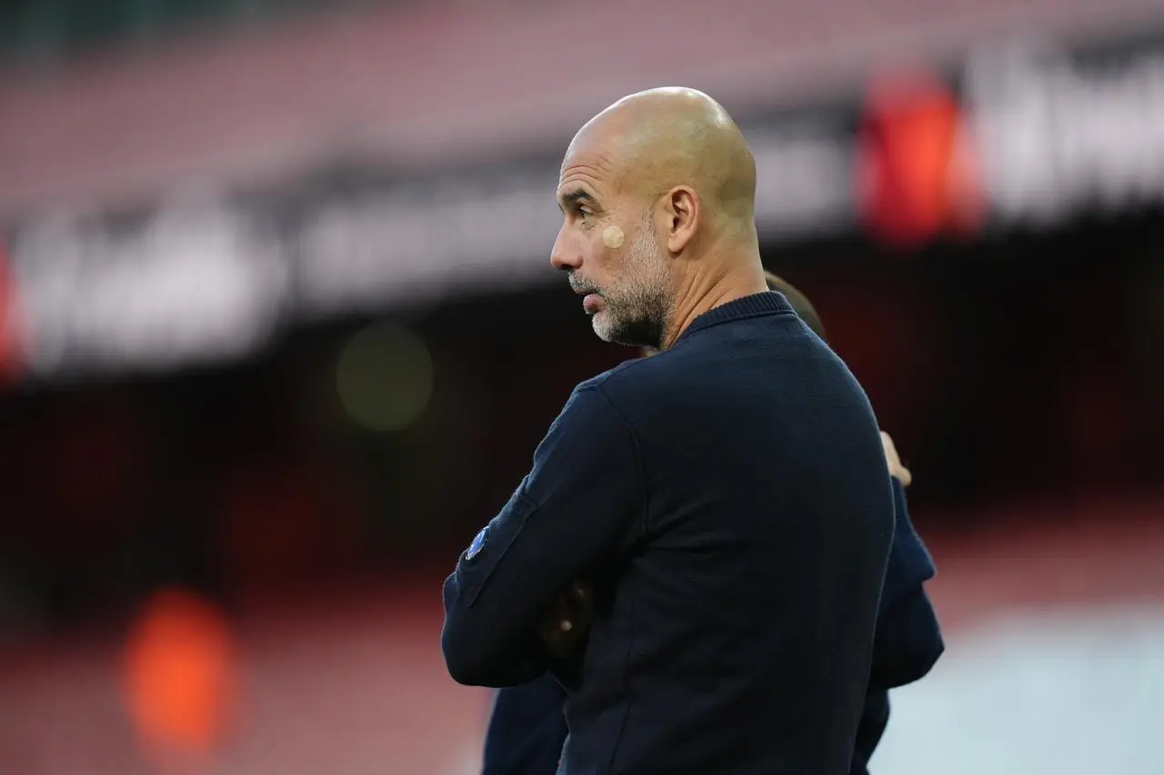 Pep Guardiola watches Manchester City in action at Arsenal
