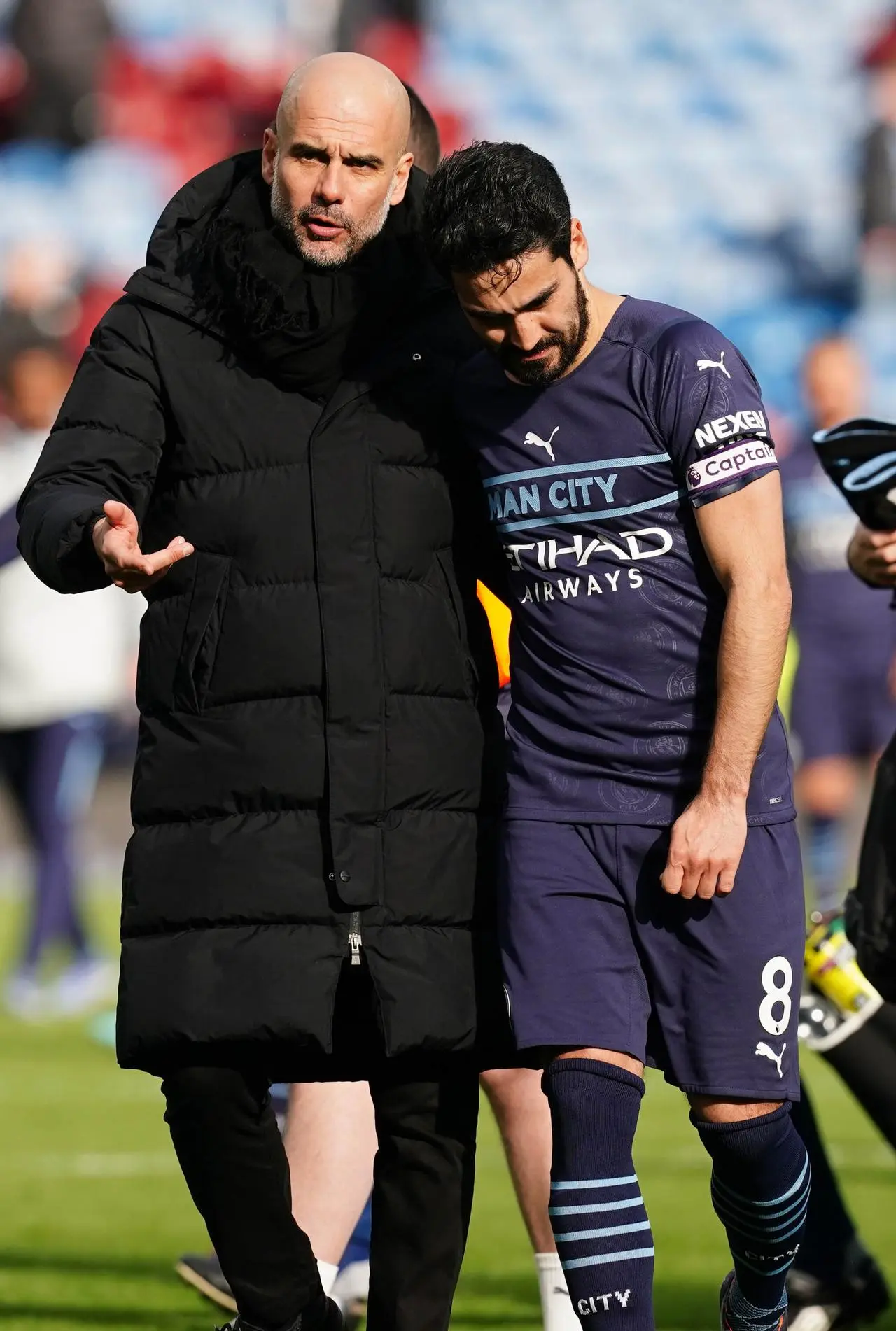 Manchester City manager Pep Guardiola (left) with Ilkay Gundogan after a game at Burnley