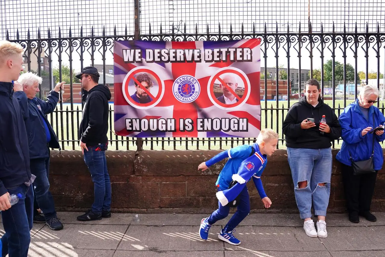 A banner in protest of Rangers manager Russell Martin and CEO Patrick Stewart.