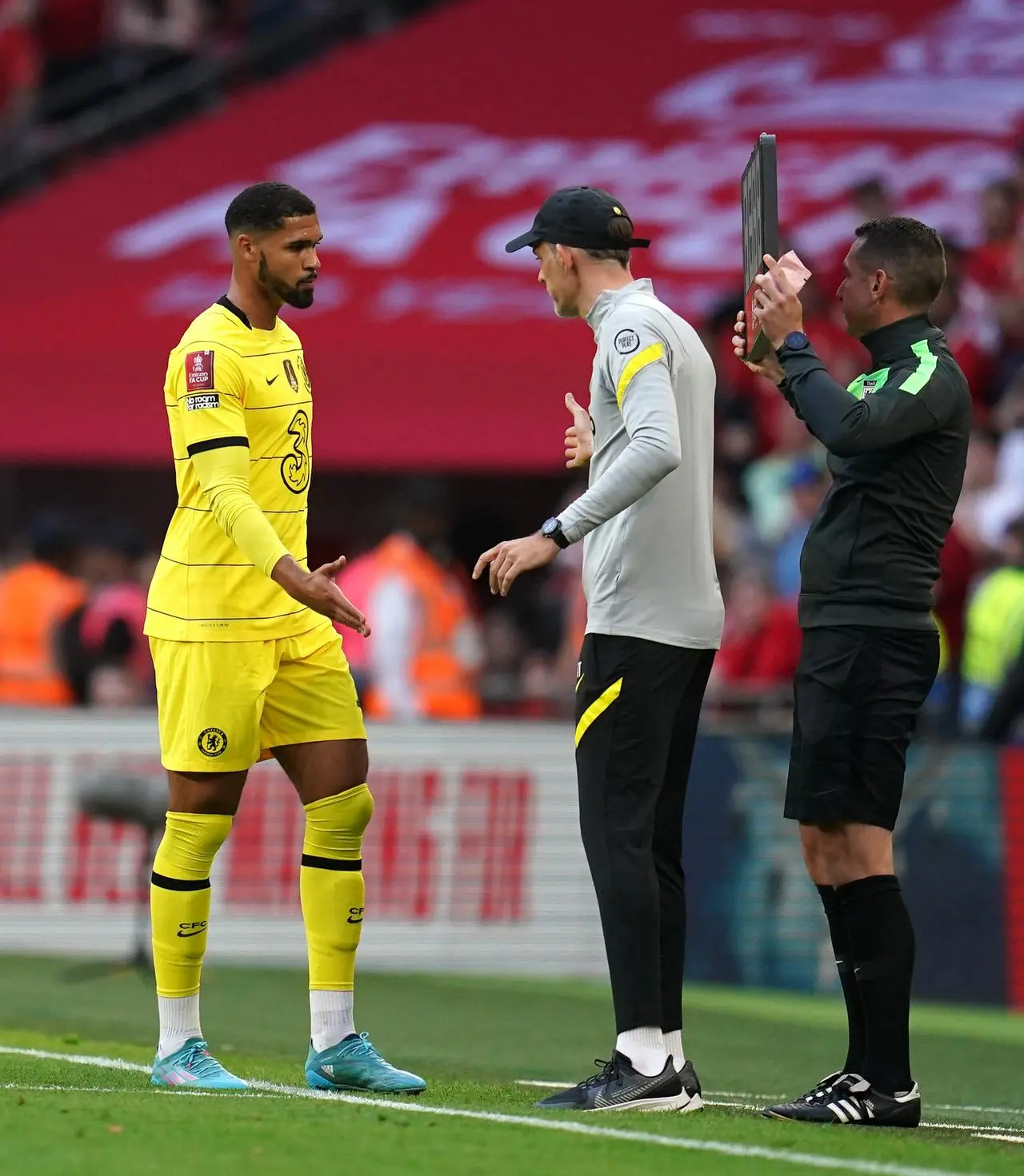 Ruben Loftus-Cheek, left, shakes Thomas Tuchel's hand