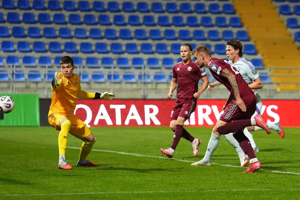 Zakhar Volkov scores an own goal in the second half against Scotland 