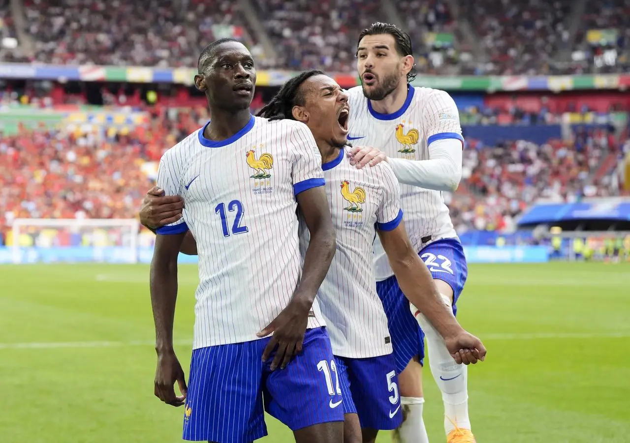Randal Kolo Muani celebrates after scoring for France